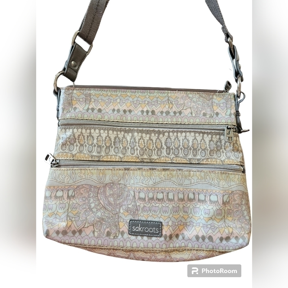Sakroots crossbody purse with a boho vibe.